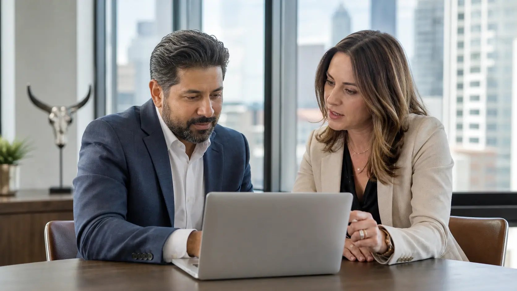 Employer team reviewing payroll hours to calculate full-time equivalent employees